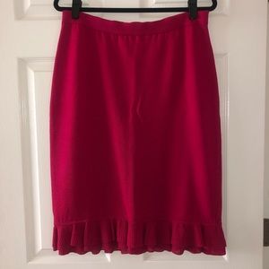 Fuchsia St. John Collection knit skirt with ruffled/flared hem. Elastic waist.